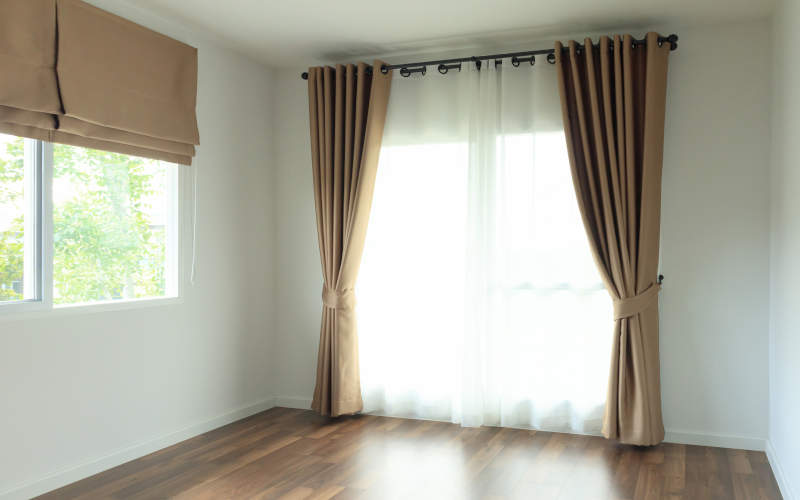 Thick curtains prevent heat loss